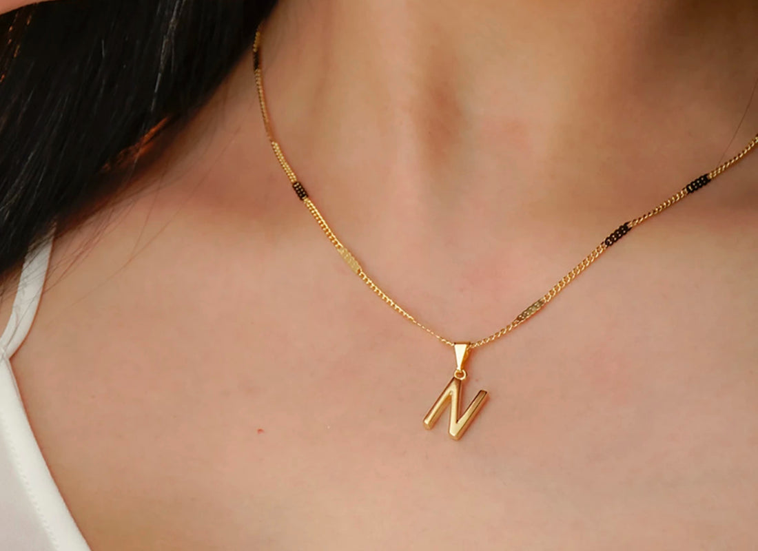 DIJE LETRA ORO